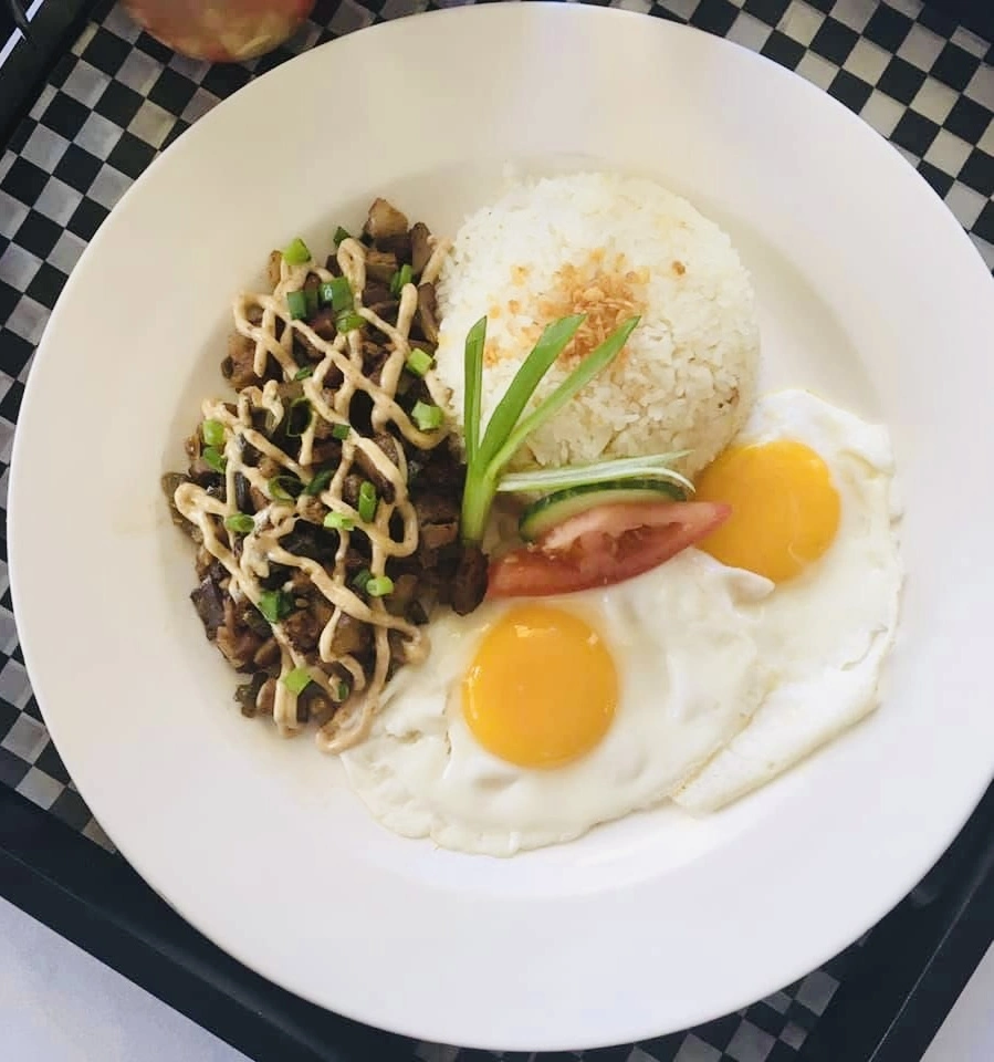 Pork Sisig — sizzling Filipino pork dish at Couple Chef Restaurant Winnipeg